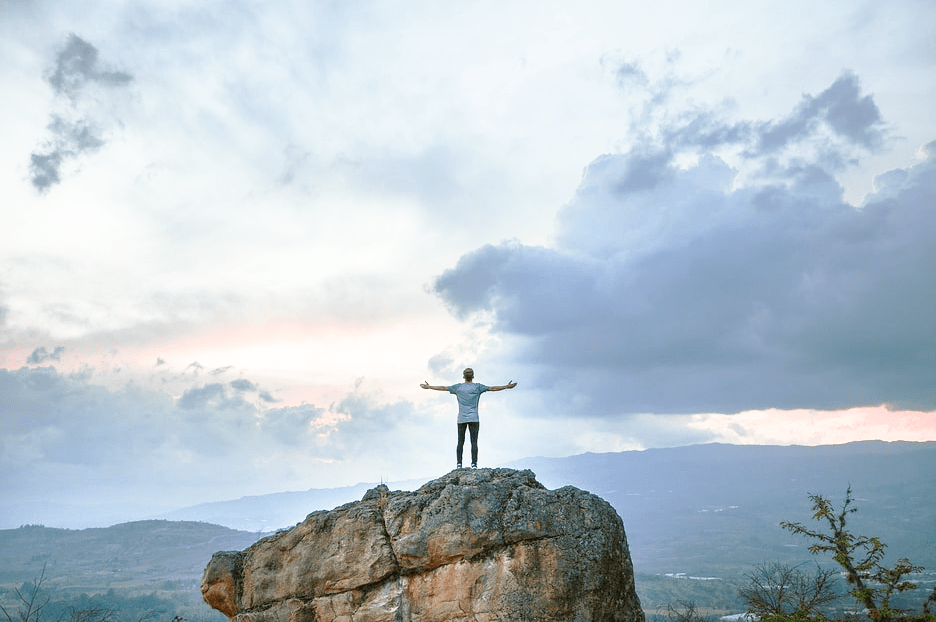 Picture of man in wild openning arms